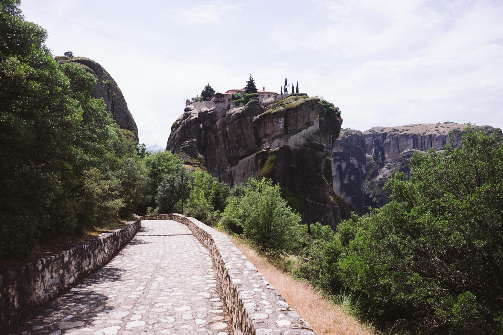 Meteora, Greece travel tips including places to visit, landscape photography locations, the best monasteries, and other information. Holy Trinity Monastery in Meteora